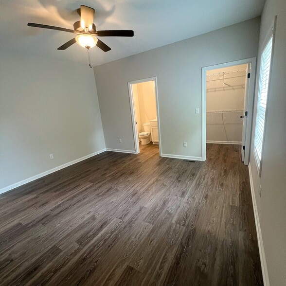 Each bedroom feels like its own suite, complete with a private bathroom and closet - 205 Cherry Way