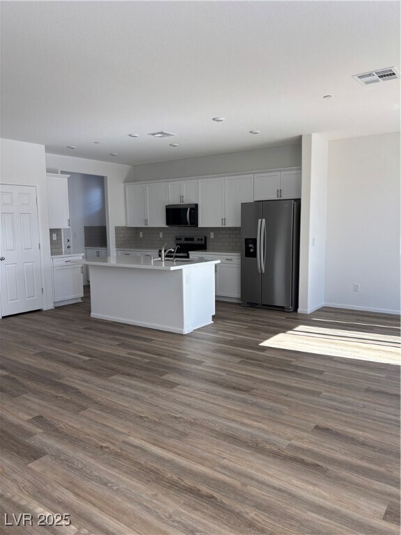 Building Photo - 4699 Woodland Ave