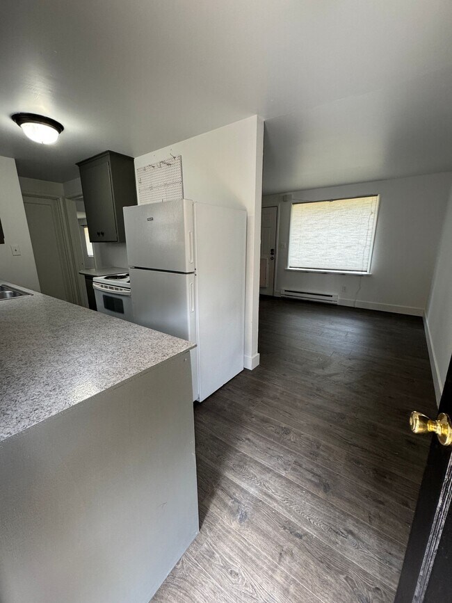 Building Photo - Spacious Two Story (2BR/1BA) Home with Large Fenced-In Yard