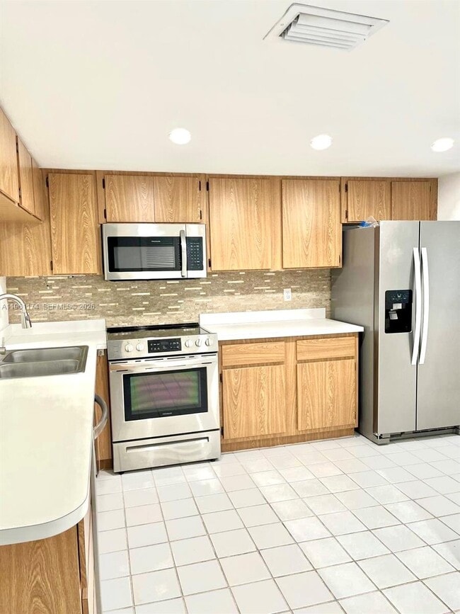 Building Photo - 1005 Palm Beach Trace Dr