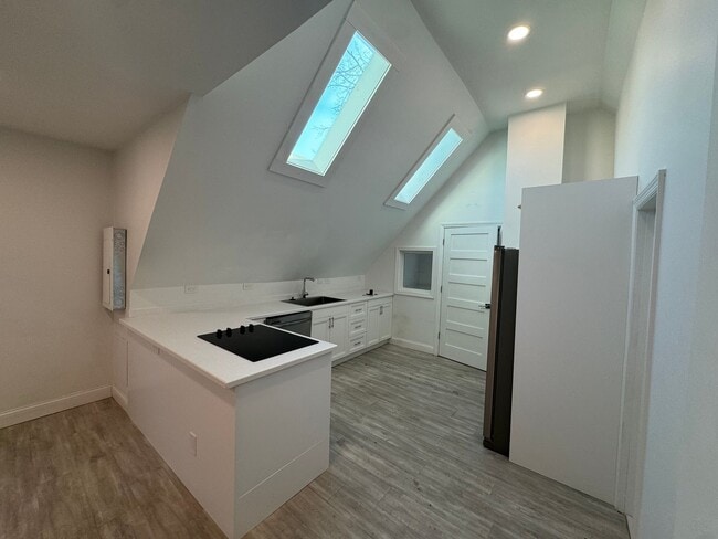 Building Photo - Stylish & Modern Living in the Heart of Tr...