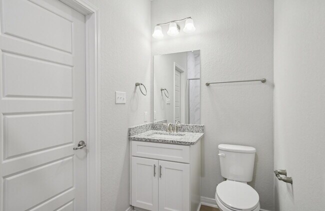 Building Photo - "Charming 3-Bedroom Duplex in San Antonio with Granite Elegance!"