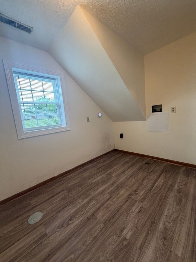 Building Photo - One Bedroom Duplex