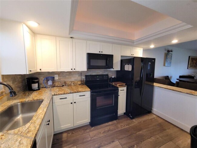 Building Photo - 104 Capri Isles Blvd