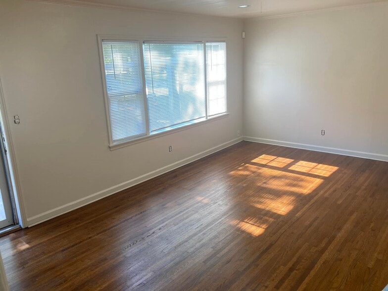 Fresh light paint throughout...Living Room - 5307 S Detroit Ave