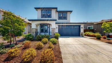 Building Photo - PURE Property Management Presents: Modern 4 Bedroom Home in Coffey Park!