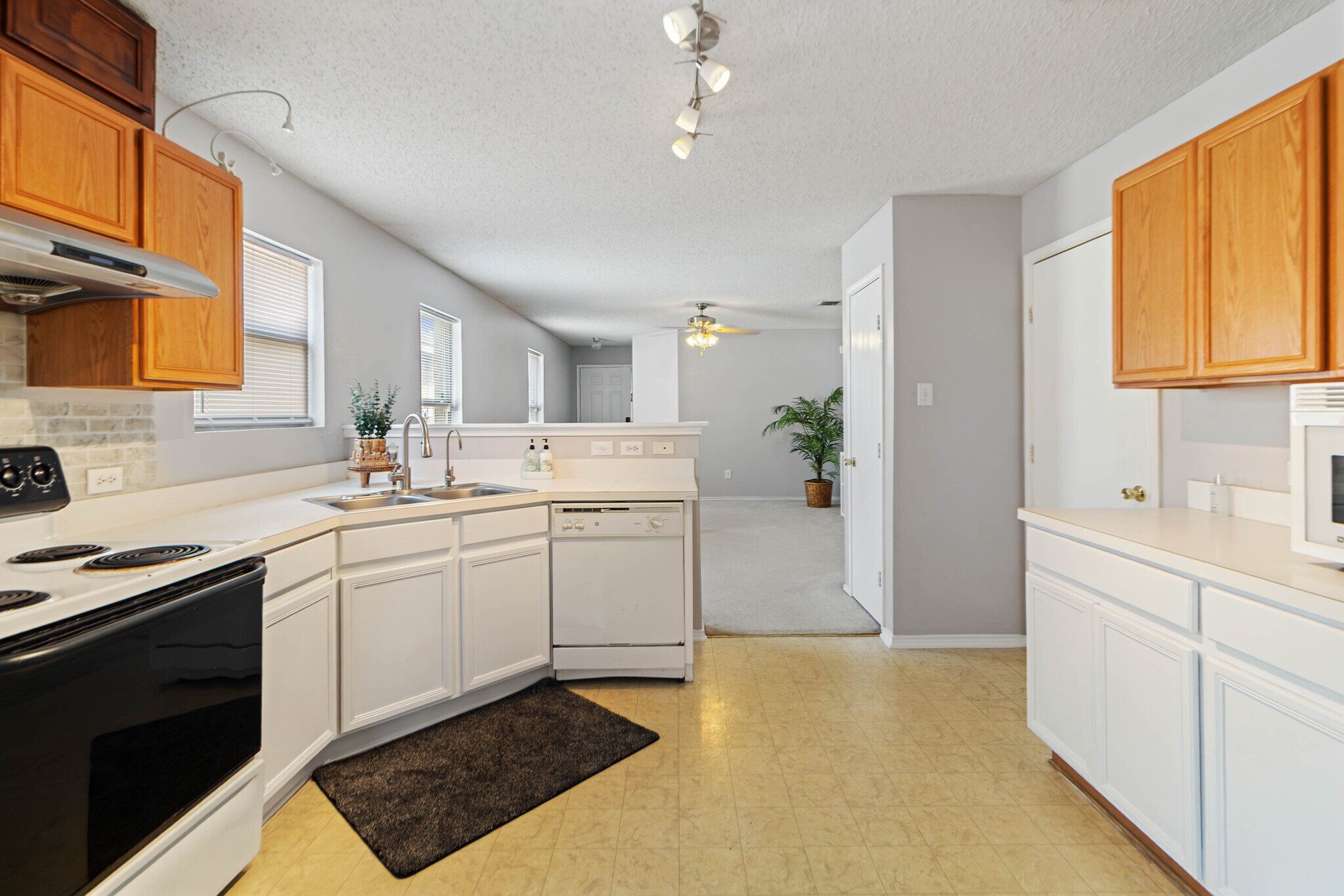 View from kitchen to living room - 6717 Waterhill Ln