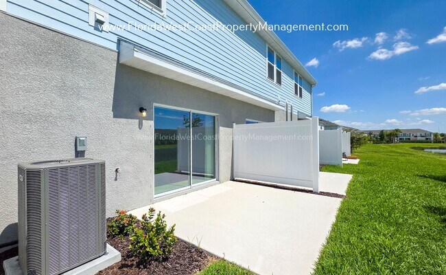 Building Photo - OUTSTANDING BRAND NEW TOWNHOME MOVE IN READY! AZARIO TOWNHOMES LWR !