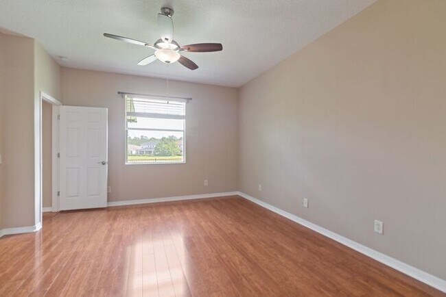 Building Photo - Executive Living Waits!