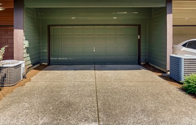 Two-car garage and driveway - 4828 SE Teakwood St