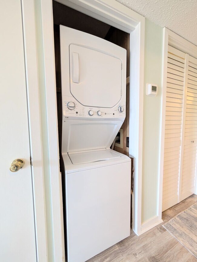 Building Photo - Dreamy Little River Condo — Furnished, Elevator Access, Pool & Marina Nearby!