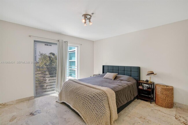 Building Photo - 7744 Collins Ave