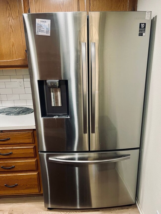 Building Photo - Affordable Comfort in 55+ Guard-Gated Comm...
