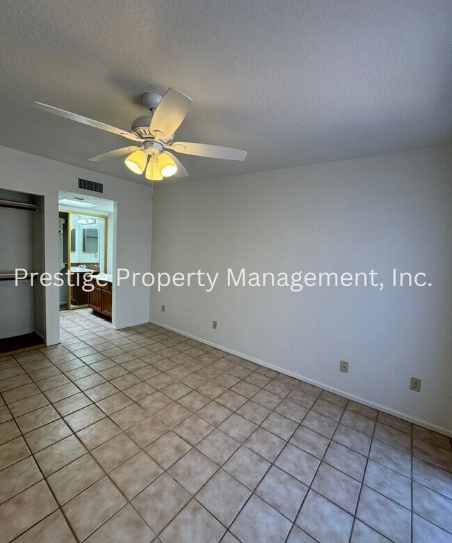 Building Photo - Totaling 3/3 With The Guest House; This Lovely Central Townhome is Everything You Need!