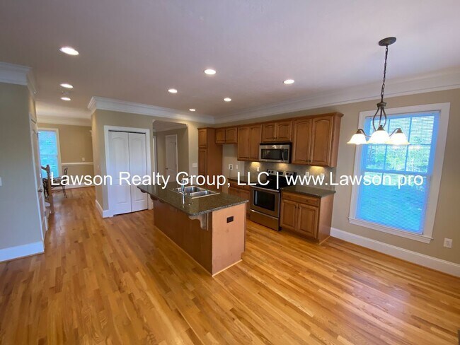 Building Photo - Colonial Green Row Home with Two Car Garage