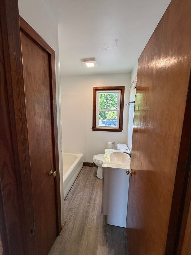 Building Photo - Charming 4-Bedroom Cape Cod Home with Spacious Yard & Storage