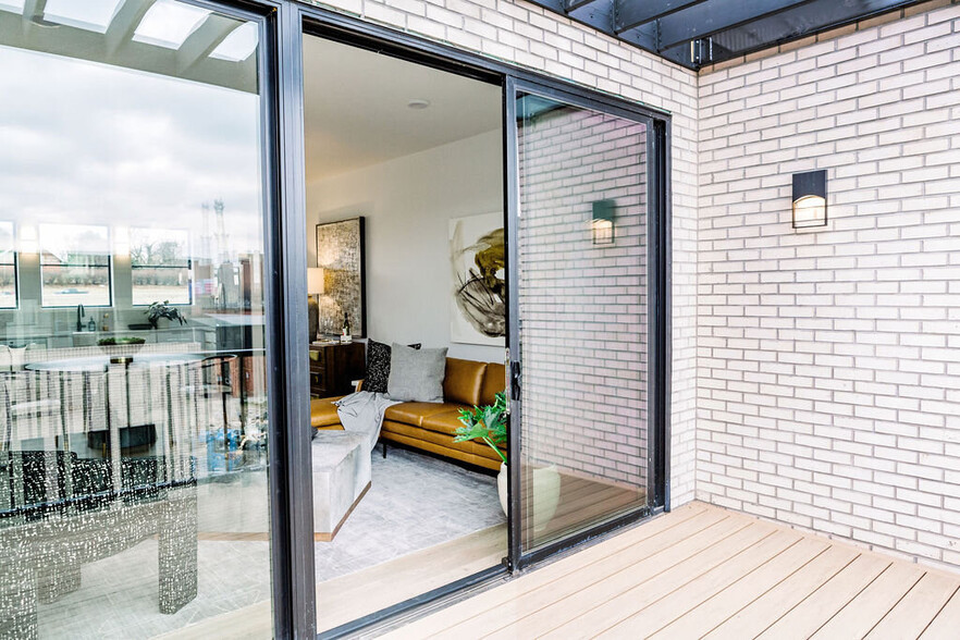 Unit Similar to this photo. Includes smaller patio without the brick wall. - 920 12th St