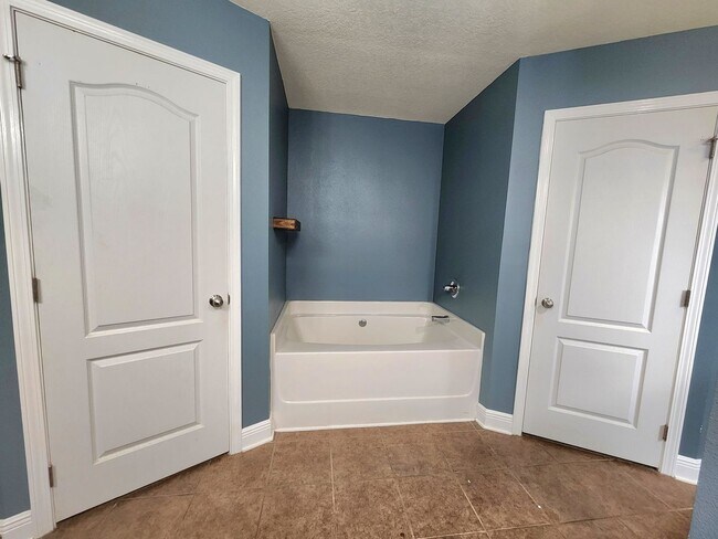 Building Photo - Welcome to your 4/2 dream home in Pace Mil...