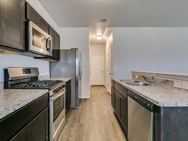 Building Photo - Four Bedroom | Two and a Half Bath with Full Service Lawncare