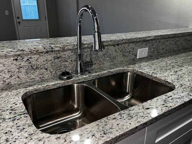 Building Photo - Modern 3BR Townhome w/ Garage, Private Yard & No Carpet – Built 2022