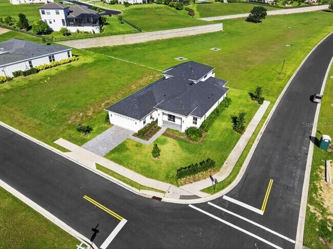 Building Photo - 200 Snowy Orchid Way