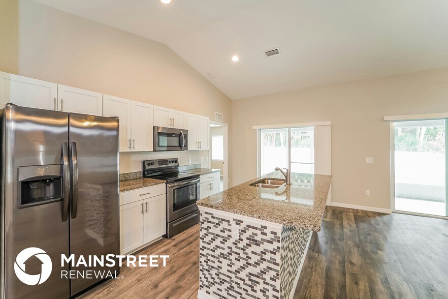 Building Photo - 5697 Babroff Terrace