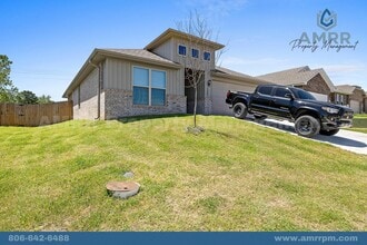 Building Photo - New Beginnings Start At AMRR: 4 bedroom / 2 bath in Apple Crossing!