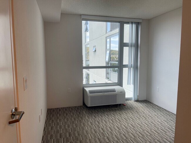 Building Photo - Come live with us at Hale Ka Lae! 2x2