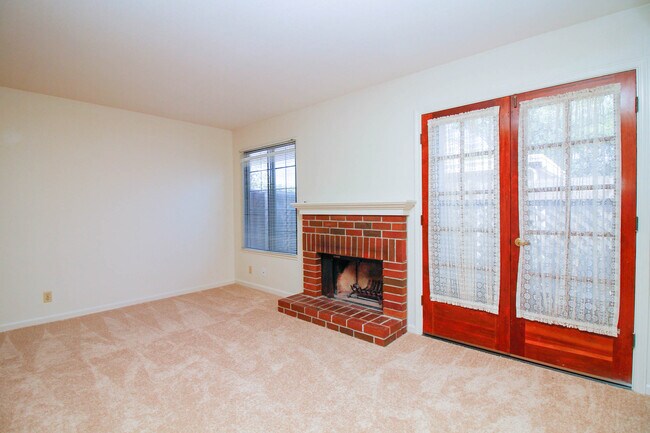 Family Room with Fireplace & Backyard door - 385 S Bernardo Ave