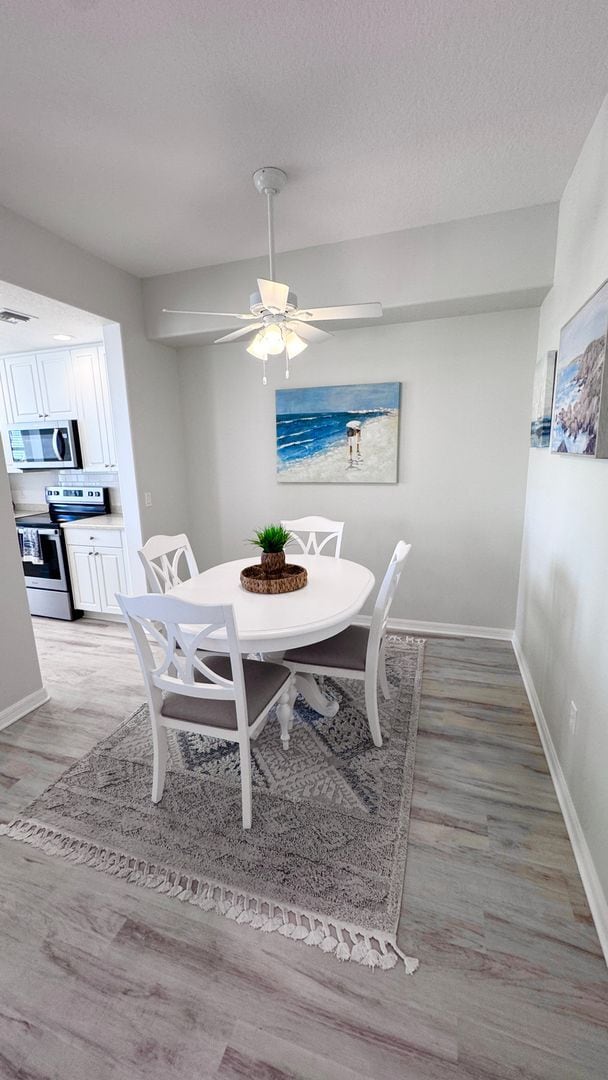 Building Photo - Elevated Luxury at The Terraces – 4th Floor Lake & Golf Course Views! 55+ Community!