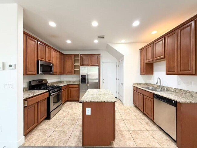 Building Photo - 9328 Flowering Tulip Ave