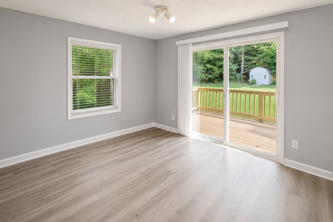 Building Photo - Updated Multi-Bedroom Home | Brand-New Deck | Circular Drive | Triad Premier Realty