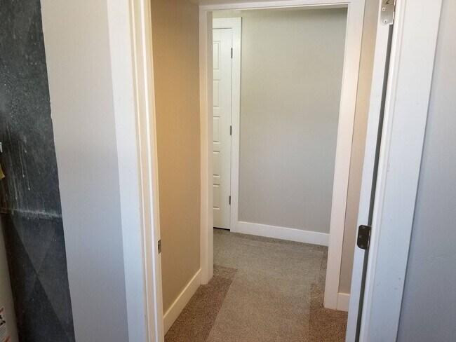 Building Photo - Spacious 5-Bedroom Magna Home with Deck and Ample Parking
