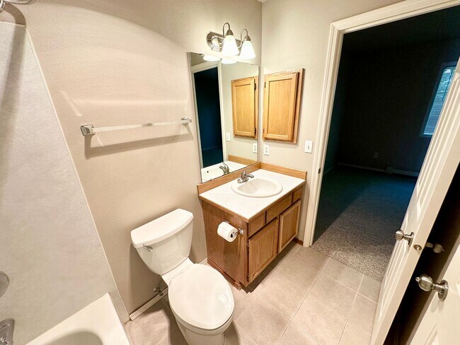 Building Photo - Introducing the Perfect Townhouse Steps Away from Central WA University!