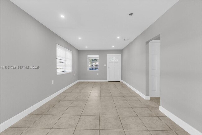 Building Photo - 6940 NW 6th Ct