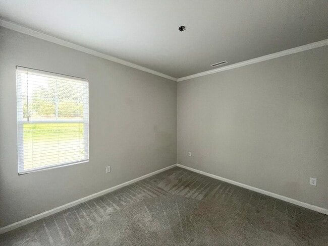 Building Photo - Newly Built 4BD, 3.5BA Zebulon Home with a First Floor Bedroom and Screened Patio in an HOA Commu...