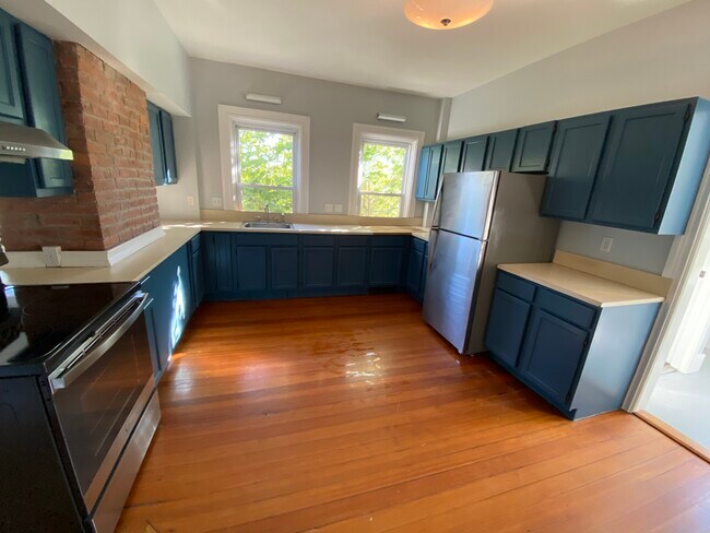 Kitchen with new appliances - 86 Holden St