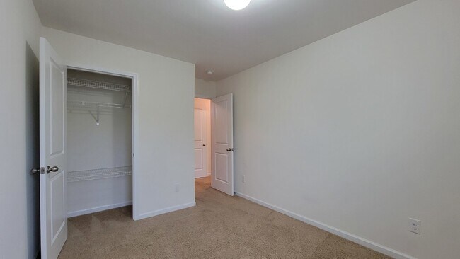 Building Photo - "Modern 3-Bedroom Multiplex with 3 Full Ba...