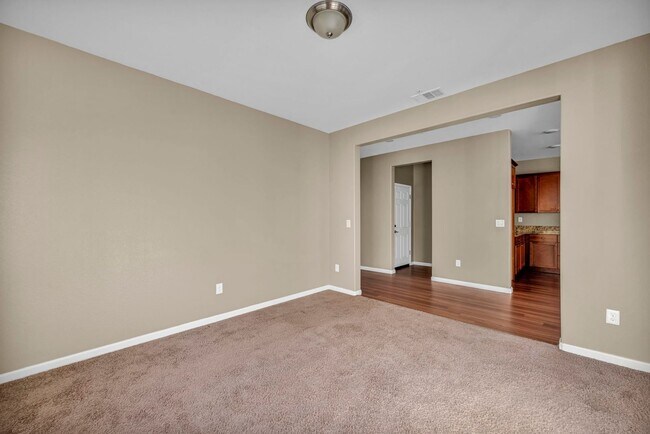 Building Photo - Sun-Filled, Spacious Living with a Three-Car Garage