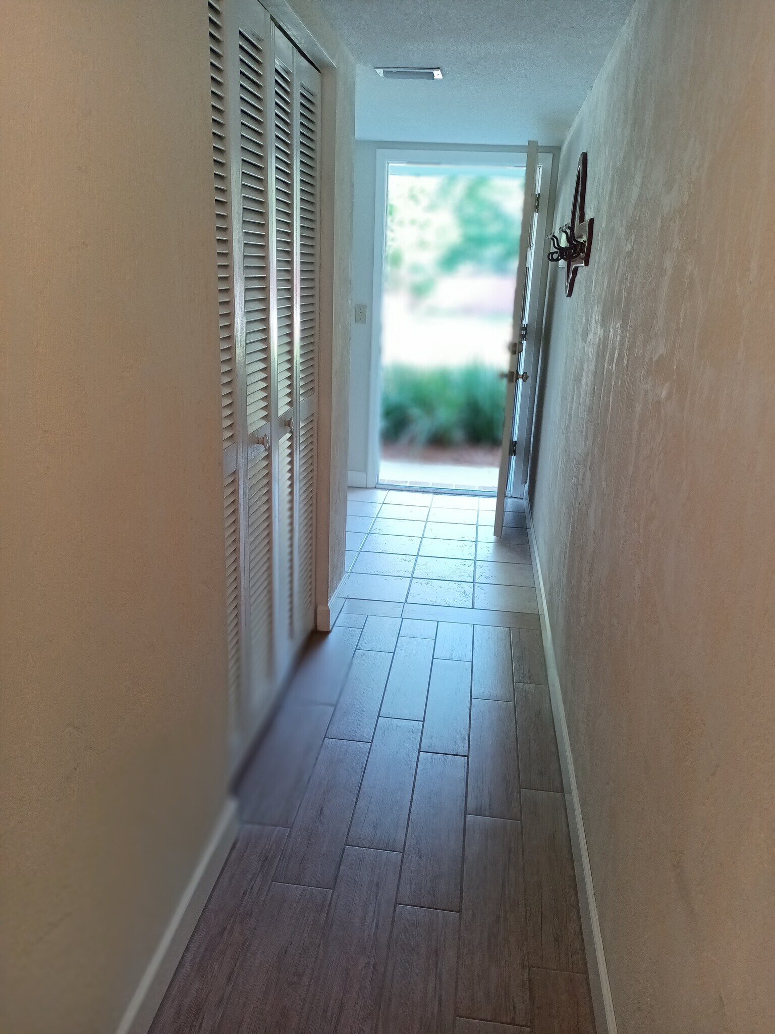 Entry Hall with Coat Closet - 818 Hand Ave