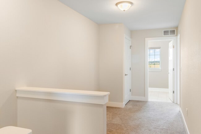 Building Photo - W218N16066 Tiger Lily Dr