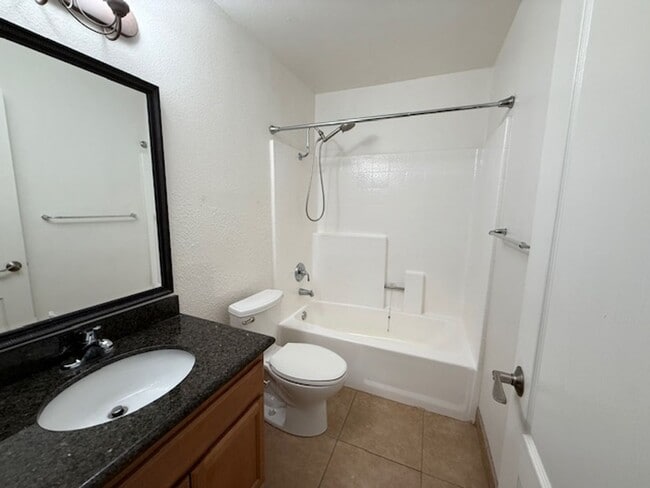 Building Photo - Resort-Style 2BR/2BA First-Floor Condo in Gated Lucera Community Near UTC