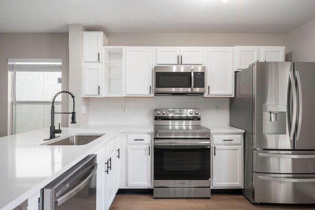 Building Photo - Fully Renovated Samara Lakes Home with Stunning Water Views!