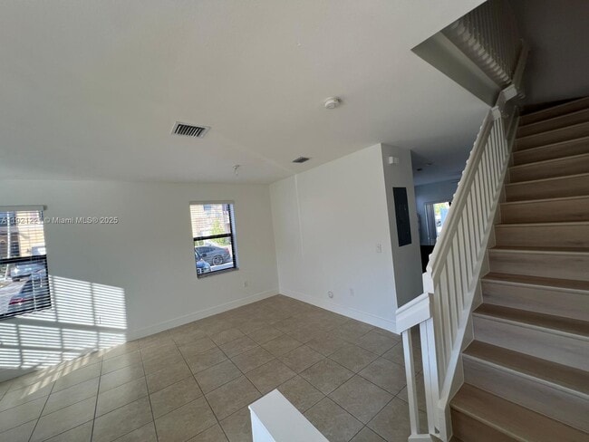 Building Photo - 9399 W 33rd Ln