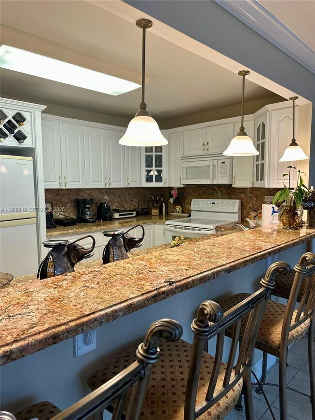 Building Photo - 7135 Collins Ave