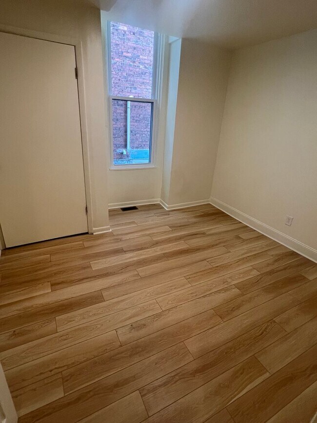 Building Photo - 209 Coltart Ave