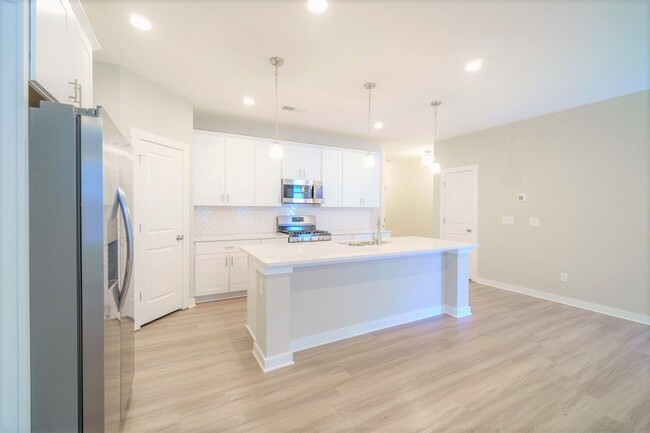 Building Photo - Brand New Construction Luxury Townhome in ...