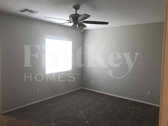 Building Photo - 8334 W Hughes Dr