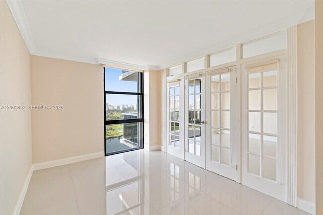 Building Photo - 3675 N Country Club Dr