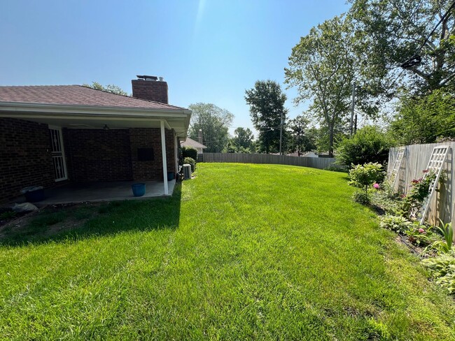 Building Photo - Corner Lot Beauty with Basement & Big Back...